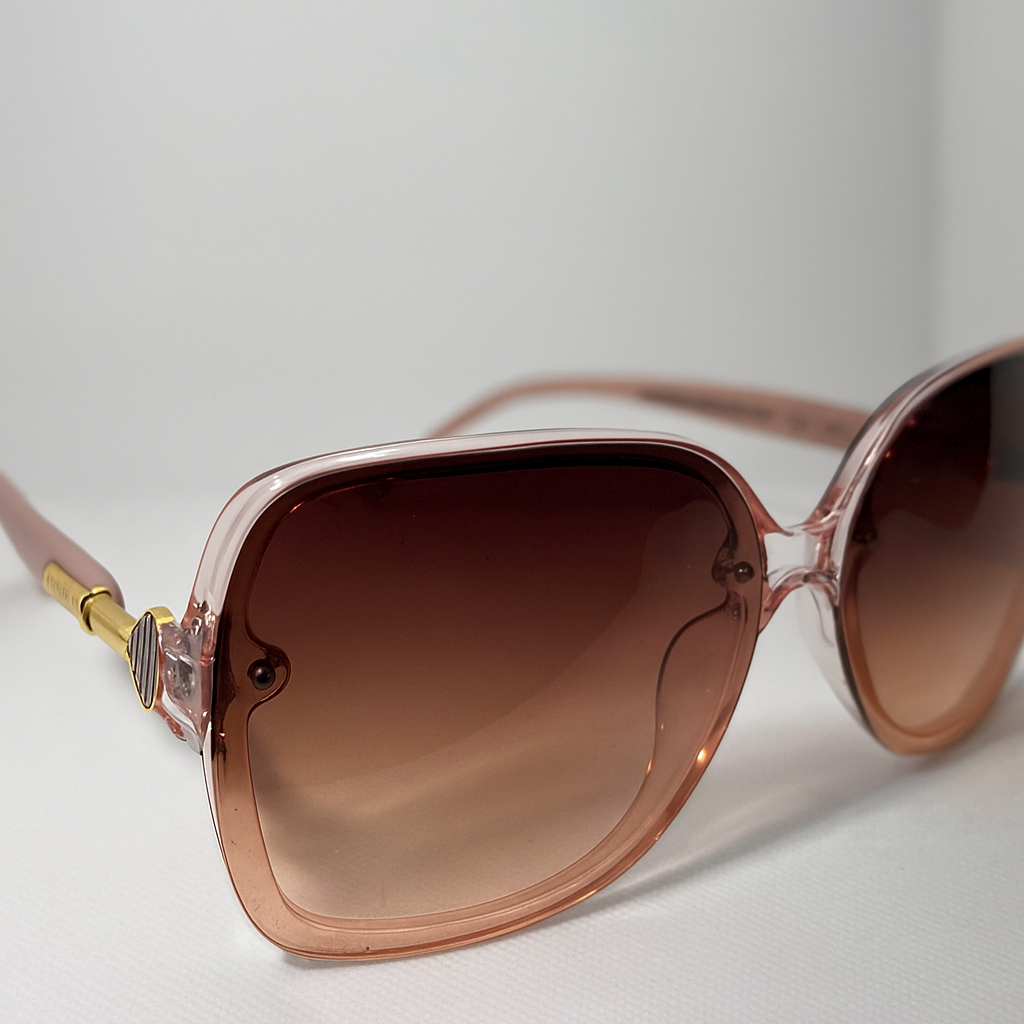  Meeran ROYAL sunglasses with pink lenses and a black/pinkframe, featuring UV protection